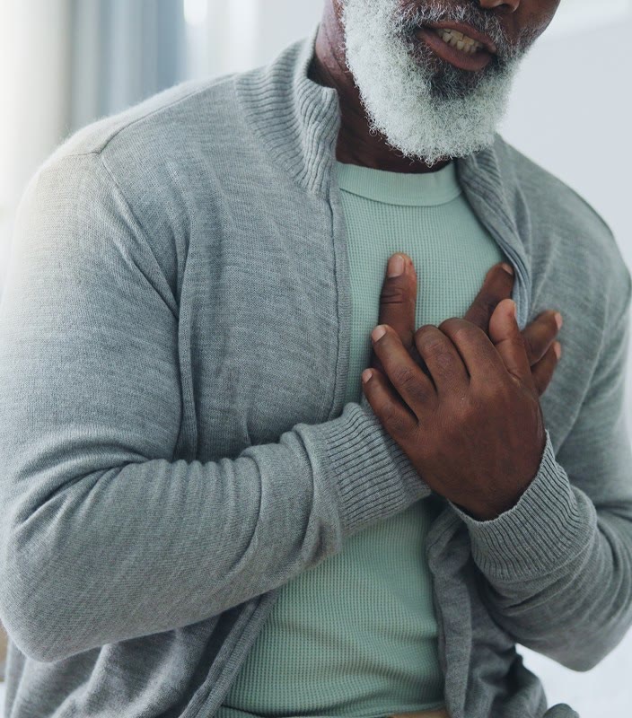 A hand resting on the chest